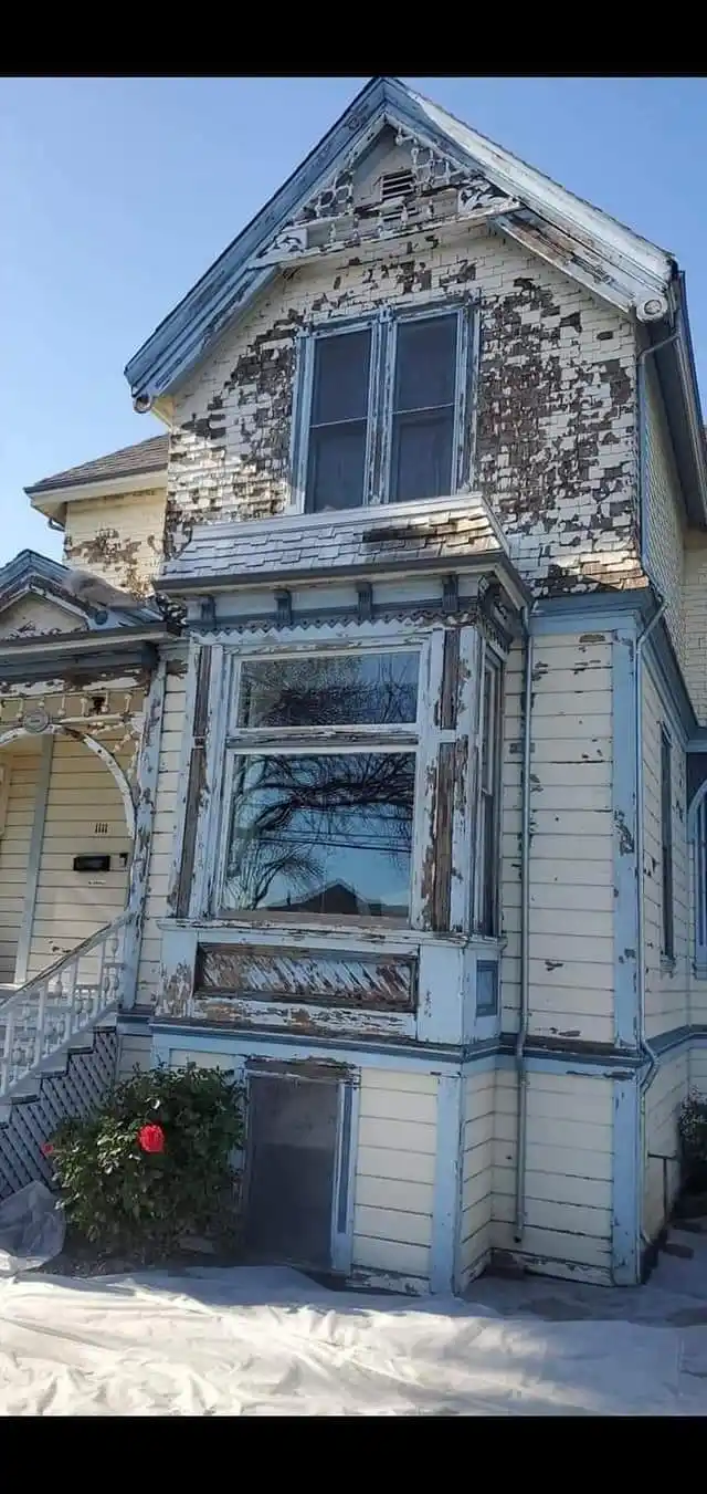 house with paint chipping off